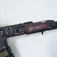 uh_fam.jpg Rail cover with stoper for Airsoft