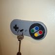 photo_2024-08-30_22-07-19-3.jpg SUPER NINTENDO KEYCHAIN AND HOLDER