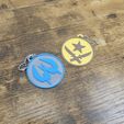 1000039323.jpg CSGO-Counter Strike Keychains (CT and T)
