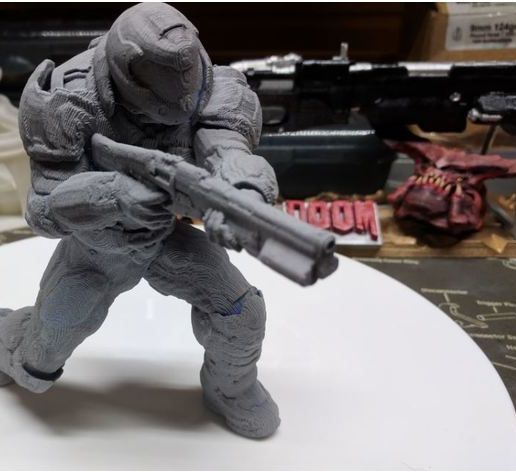 Doomguy posed with shotgun
