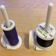 Holders-with-thread-spools.jpg Spool Holder of a Singer sewing machine