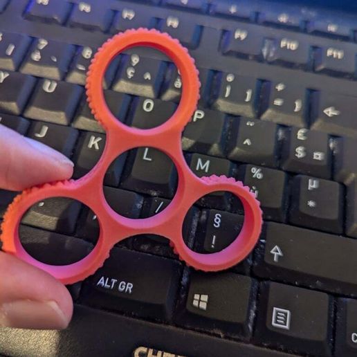 49f587e4-7913-49f0-b2d5-a8f8123ba7d1.jpg textured fidget different size