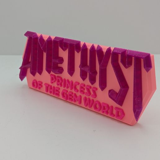 PXL_20240723_164417079.jpg Ametista - logótipo de banda desenhada