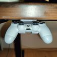 3900f8ba-cdb0-41a4-8894-f38b3dc39e64.jpg PS 4 Controller Holder - under the table edition