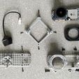 Assembly-Example-Parts.jpg Lightweight Case for a Naked RunCam ThumbPro - Skeletonized Universal