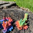 346106017_1439403660162672_1282862201999010174_n.jpg Free STL file Rainbow Dragon Keychain・Design to download and 3D print