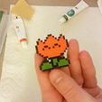Capture_d_e_cran_2016-01-21_a__15.10.31.png Free STL file Pixel Fire Flower (Magnet or Pin) - Super Mario World・3D print design to download