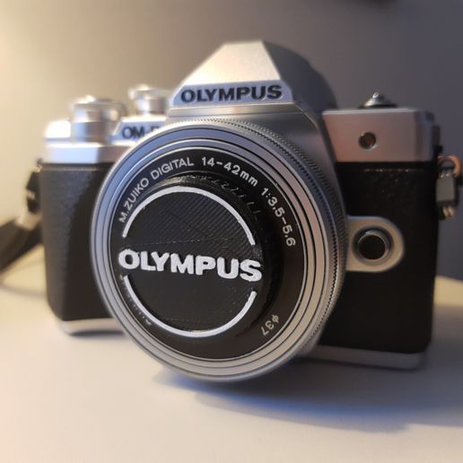 Olympus_37mm_Lens_Cover.jpg Olympus Micro Four Thirds Screw In Lens Cap