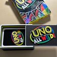 3179497d-e0c3-44b5-969a-fb6c7abf68cc.JPG Uno All Wild Card Box (Remixed Lid) - Go Crazy With Colors!
