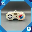 il_fullxfull.6721333082_2bgi.webp Retro Controller Fidget Keychain STL – 3D Printable Clicker Toy with Keyboard Buttons | STL File Pack for Gamers, Nerd Gifts, Fidget Lovers
