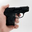 IMG_4311.jpg PISTOL RUGER LCP MOVABLE TRIGGER PARTS articulated