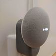 Montaje de la toma de corriente de Google Nest Home Mini, limpio y minimalista