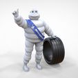 Mim-1.1.25.jpg Michelin man with his tire