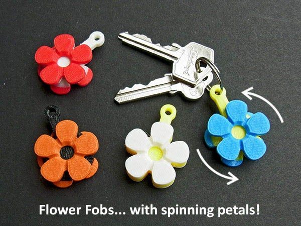 flowerfobs_display_large.jpg Download free STL file Flower Fobs... Flower Key Fobs that Spin! • 3D printer design, Muzz64