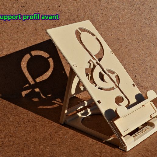 FOLDING SUPPORT FOR SMARTPHONE OR TABLET TELEPHONE - Reason: Ground key ...    Foldable support for mobile phone and small digital tablet - pattern : " Treble clef "