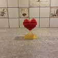 Salikts_UGC_1.jpg Heart shaped Tetris puzzle with a stand
