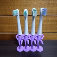 1.JPG Les hommes à la tête de brosse à dents