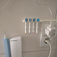 Capture d’écran 2017-05-09 à 15.04.01.png Toothbrush holder over bathroom socket