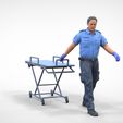 AW1-1.1.6.jpg N1 Ambulance worker pulling wheeled stretcher or trolley