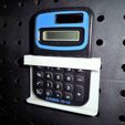 In_action_50.jpg Pegboard Calculator Holder Snap-fit