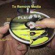 002_Remove_Media_display_large.jpg CD/DVD Media Storage