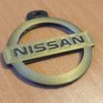 312626923_1502917876839219_365909760419695416_n.jpg Nissan logo key ring.