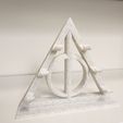 20240528_143330.jpg Deathly hallows 3 wand stand