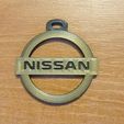 312401504_846779009699833_1108321887705984177_n.jpg Nissan logo key ring.