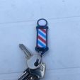 IMG_5768.jpeg barber pole keychain