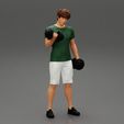 Girl-0002.jpg Muscular man working out in gym doing exercises with dumbbells at biceps