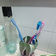 photo_2023-01-05_06-30-00.jpg Cute tooth-shaped toothbrush holder