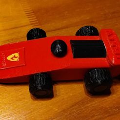 81d0a9d1-92a0-4a33-b16c-e7598d965718.jpg voiture de formule 1 ferrari des années 70-80