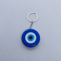 20230805_180704.jpg Oreoo and evil eye keychain