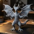 grok-image-b3ab9e90-369a-4a62-98bc-008099bdcef4.jpg Fierce Red Dragon Figurine – a highly detailed fantasy dragon 3D model perfect for display, tableto