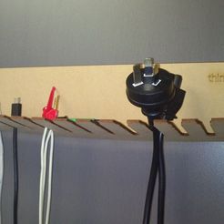 thing:251848 Customizable laser cut cable holder