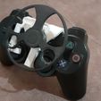 20240304_121424.jpg PlayStation 2 and 3 controller mini wheel