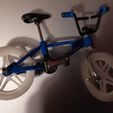 IMG_20201110_182228_resized_20201110_062305444.jpg Wheel and handlebar grip for miniature BMX toy