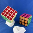 438171814_993072229051358_1339275496829222518_n.jpg Rubik's Cube stand / holder