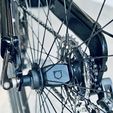 a.jpg BikeTag Stealth™ – Hidden AirTag Bike Mount – Wheel Hub STL File