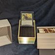 330147918_728144742309594_8977218346593291009_n.jpg Caixa de baralhos MTG Commander