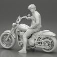 3DG-0012.jpg Young man sitting on his motorbike - Separated and non separated