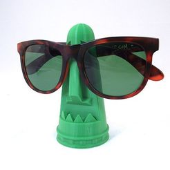 fe7fdfedac2a6cf54c9ac255c1e7b701_display_large.jpg Tiki Sunglass Holder