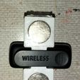 787ab497-3a85-4165-8519-25c3d7c16661.jpeg Wireless mic older - magnet