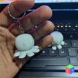 l.jpg CUTE OCTOPUS HAPPY ANGRY SPINNER TOY PLUS KEYRING
