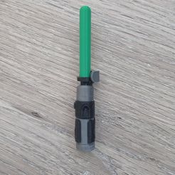 1709470389768.jpg Yoda's Lightsaber keychain
