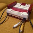 Famicom06.jpg Famicom cable support grommet for AV mod