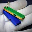 Title_q.jpg Free STL file Loud and compact Whistle for your Keychain・3D printing template to download