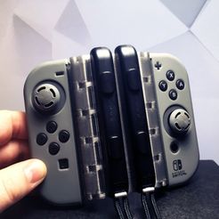 cadc66846265d4c1b6264b38626d6179_display_large.jpg Contrôleur Joy-Con repliable pour interrupteur