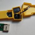 IMG-20190217-WA0011.jpeg SD holder and SD to USB adapter key shape key chain