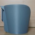 15-shaped-cup-holster.jpg modular cup/mug holder with 5 options for ataching to variouse surfacies